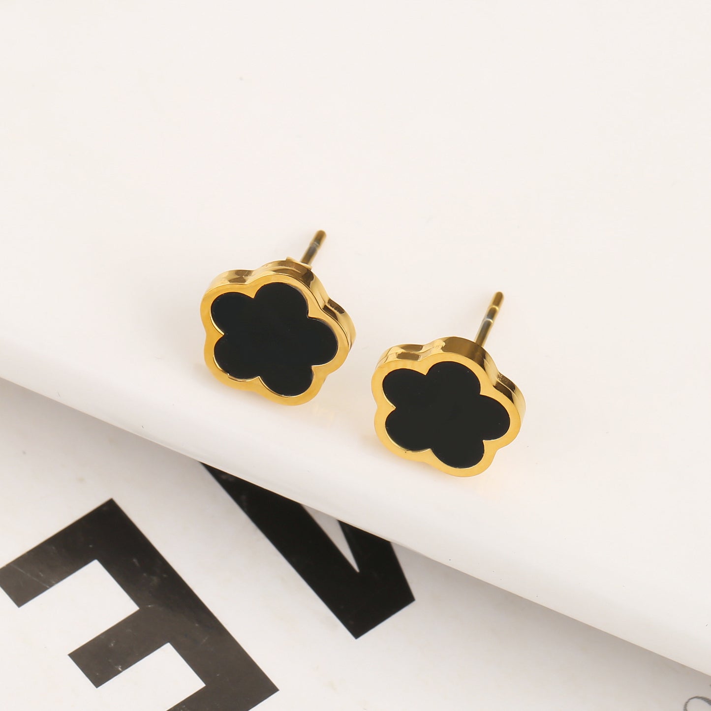 Boucles d'oreilles fleur en acier inoxydable